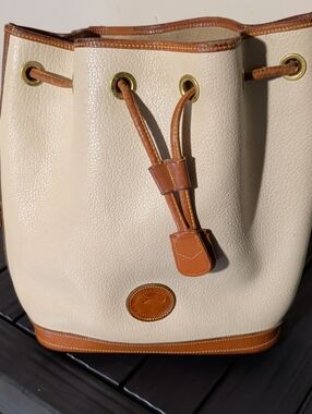 Dooney & Bourke Cream and Brown Drawstring Bucket Bag